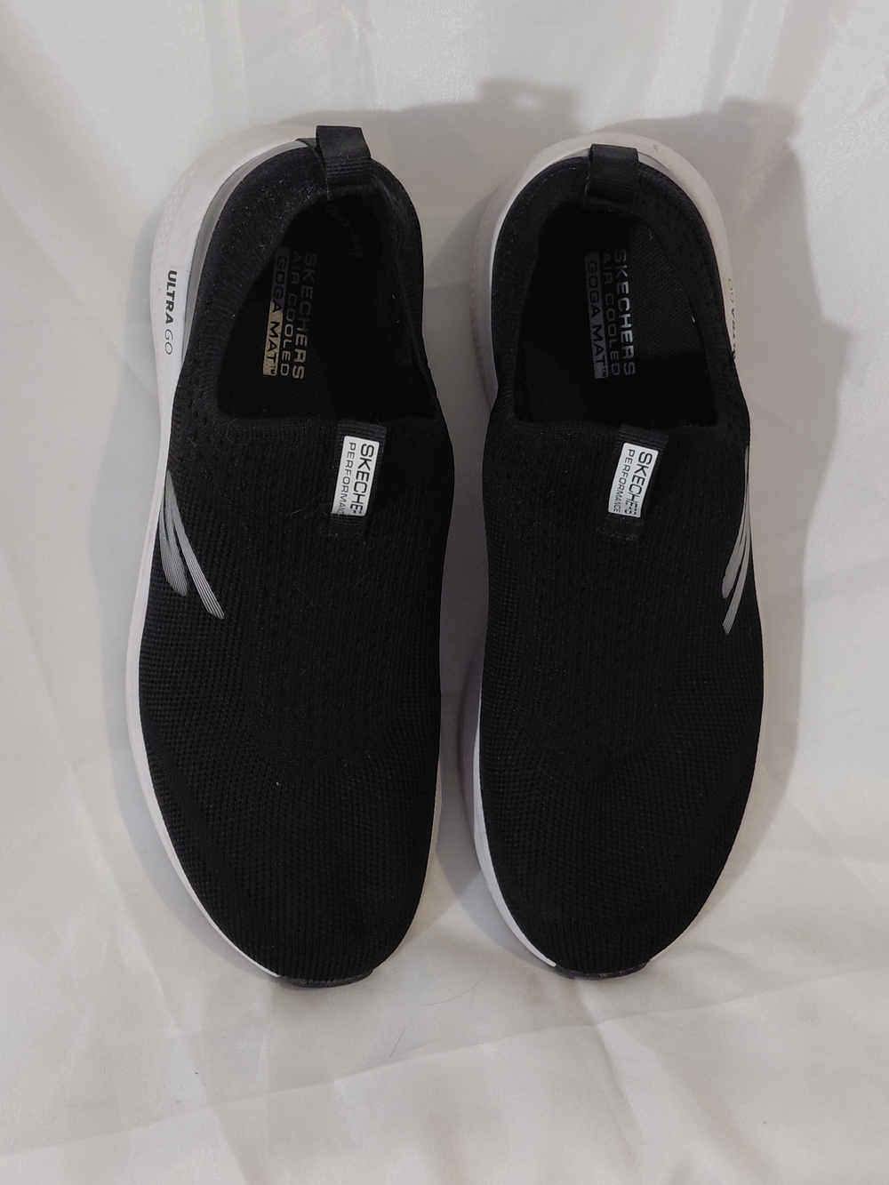 Skechers Black Slip-On Knit Sneakers with White Sole